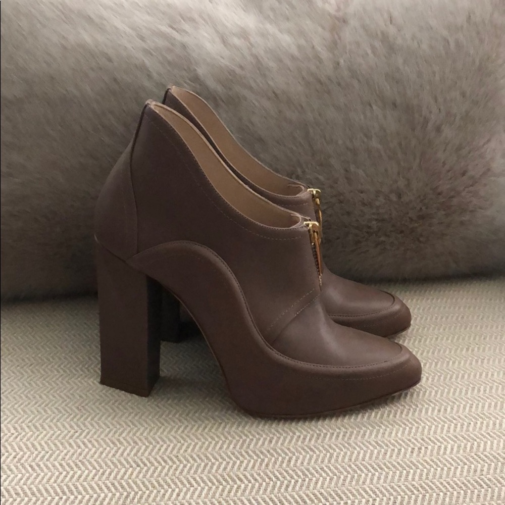 Nude booties with gold details